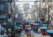 Old Delhi:  All kinds of vehicles, and they somehow reach a destination.