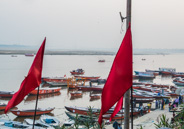 Varanasi - We arrive at the Ghat (ghat=steps area that goes to a river) as the sun starts to sink.