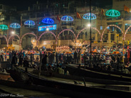 Ghats on the Ganges: Crowds on the steps and in the water.
