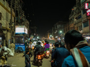 Varanasi:  My driver (blue jacket, red/white scarf) somehow negotiates this!