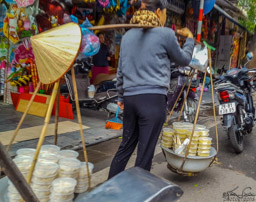A few quick photos of street activity from the moving cyclo.