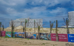We fly from Danang to Nha Trang, the Cam Ranh International Airport.  The drive near Cam Ranh Bay shows a resort area growing quickly.