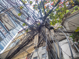 Oh my, and now they all have cell phones!  This might be electricity, which is scary.  Still, the wire tangle is not as bad as I've seen elsewhere (e.g. Old Delhi)