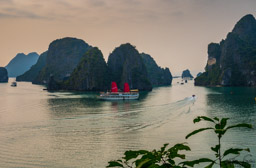 View of a ship with (fake) red sails from the Sung Sot Cave  entrance.