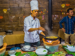 Showing us how to cook silk worms.  I didn't feel 100%, thus just wasn't hungry for worms that night!