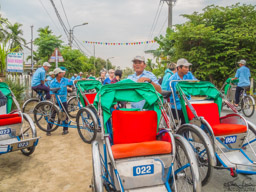 Shot of our poor cyclists, who work hard with plump Americans.