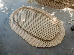 This is on the way to being a cradle, I believe.  Beautiful weaving!