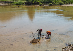 These men were using river sand to make a morter for some steps they'd just put in.