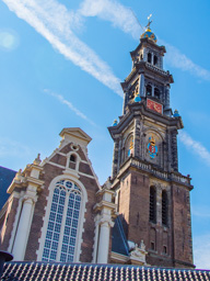 Newer church than steeple.  These combinations are seen where part of something was destroyed by war bombs and it was decided to keep what was left, use it in the reconstruction.