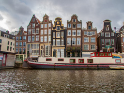Occasionally houses sink or lean in Amsterdam's wet ground.  These are called 