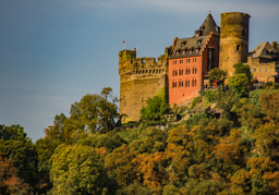 I love this colorful castle with the modern brick building integrated into the ancient castle.