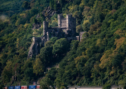 Another castle quite close to the river.  Note the train passing below the castle.