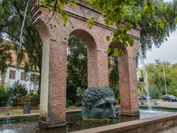 Strasbourg Janus (two faces) Fountain created in 1988 by Tomi Ungerer