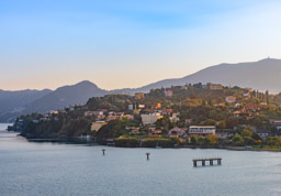 Corfu look quite hilly with lots of trees.