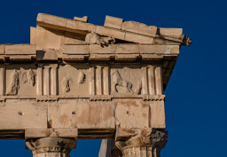 Detail, horses heads and a cat  overlooking the valley.